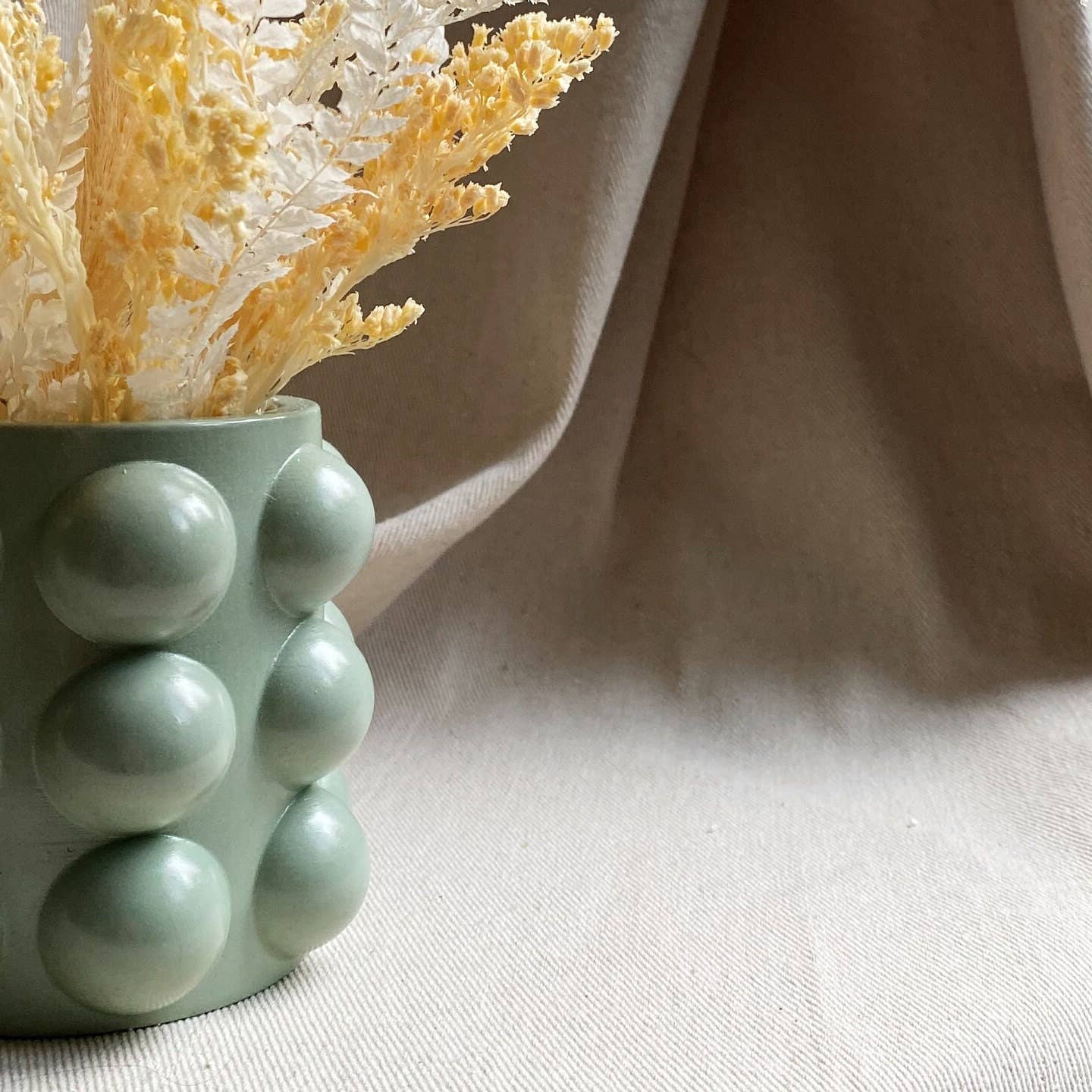 Globuli vase