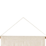Beige fabric banner with wooden frame on a white background
