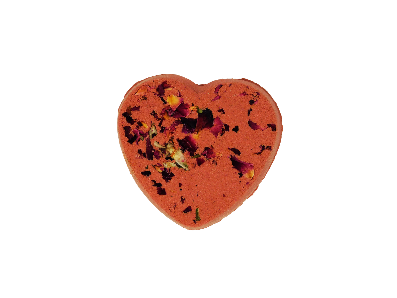 Heart-shaped orange bath bomb with floral petals on a white background