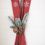PAIR OF RED WOODEN SKIS WALL HANGING