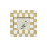 Checkered photo frame with a floral design inside on a white background