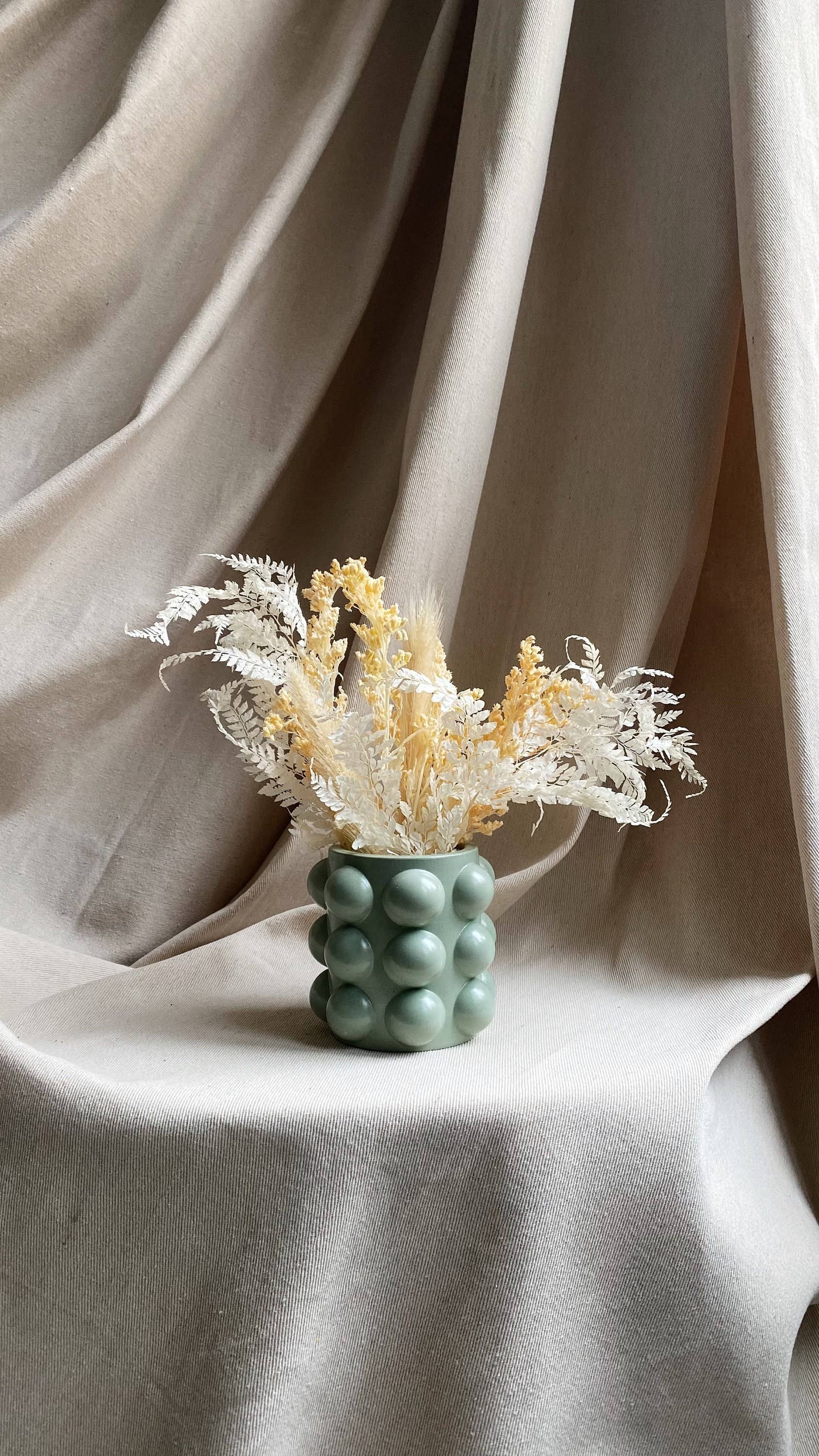 Globuli vase