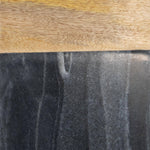 Close-up of wooden and black stone surface