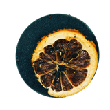 Dried orange slice on a black background
