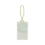 Marble-textured rectangular object with gold clip on a white background