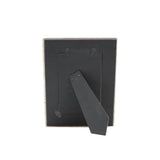 Black picture frame with a tie on a white background