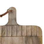 Wooden cutting board with a leather handle on a white background