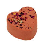 Heart-shaped bath bomb with floral petals on a white background