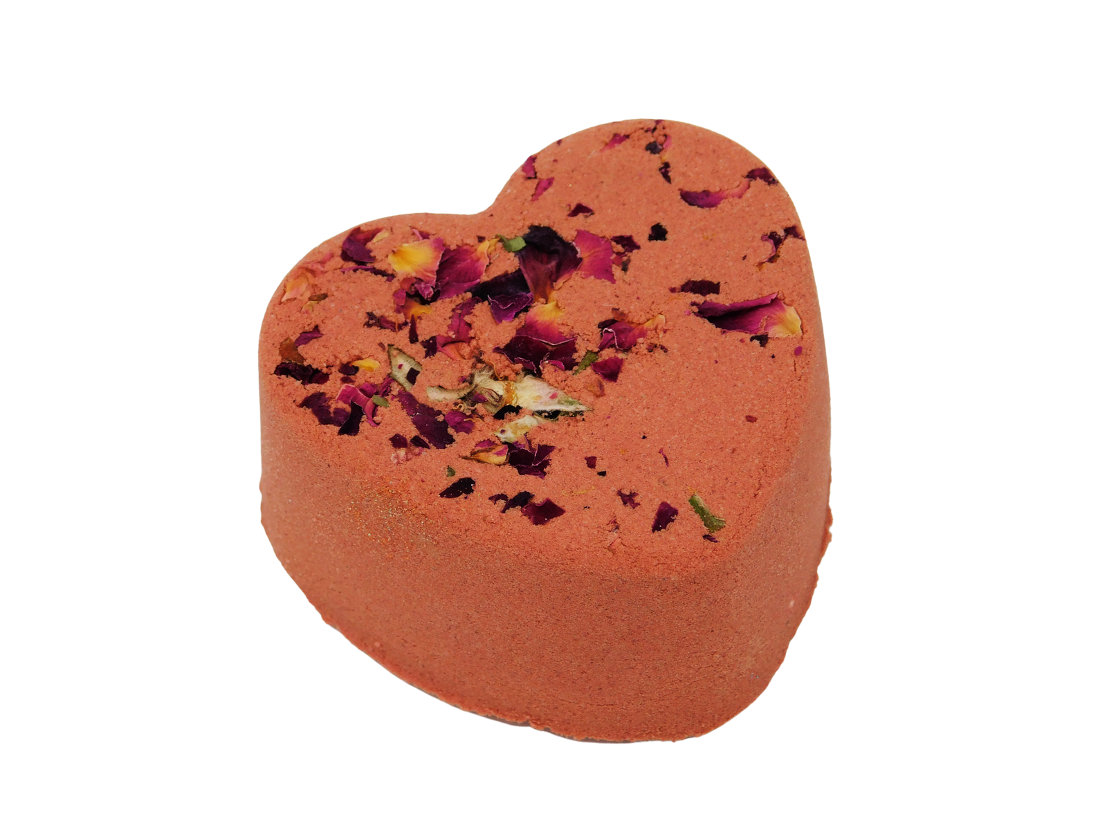 Heart-shaped bath bomb with floral petals on a white background