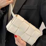 "...._ Vegan Leather Woven Crossbody Waist Bag