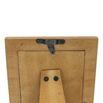 Wooden picture frame with a hanger on a white background